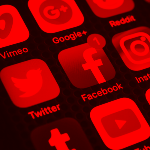 close up of a phone screen with social media icons